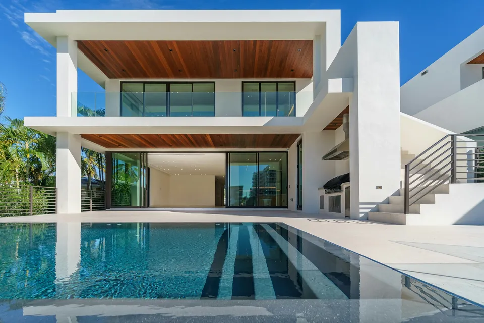 Contemporary home with a pool and covered terrace